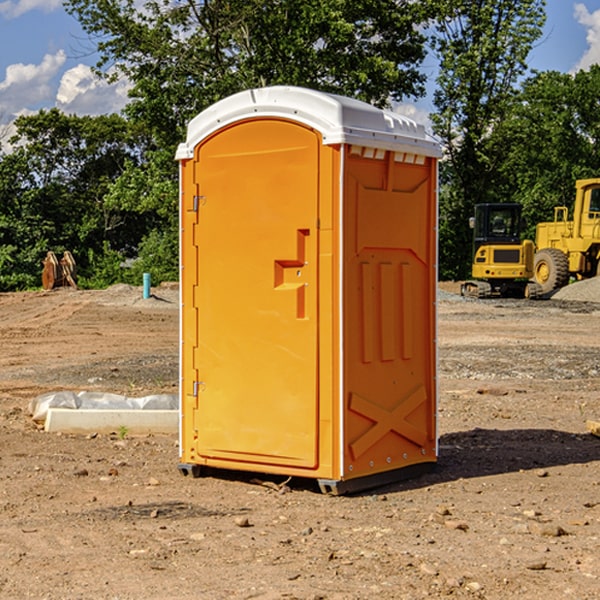 how often are the porta potties cleaned and serviced during a rental period in Rainier